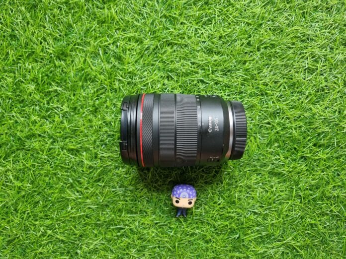 a camera lens on grass